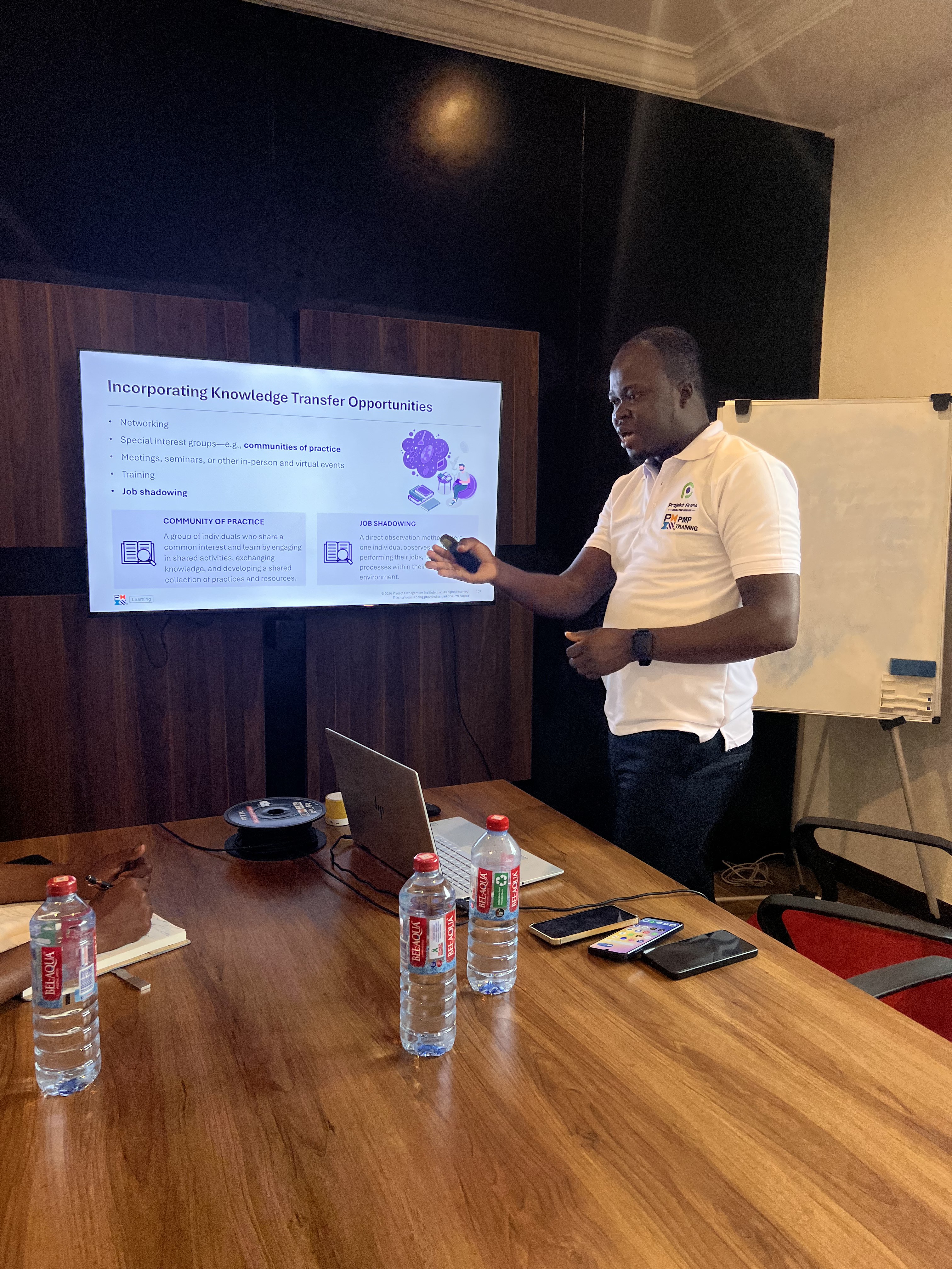 PMP Facilitator Presenting Knowledge Transfer Session